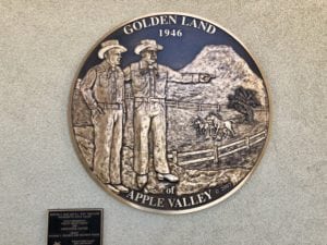 Founders of Apple Valley on crest showing Golden Land of Apple Valley 1946